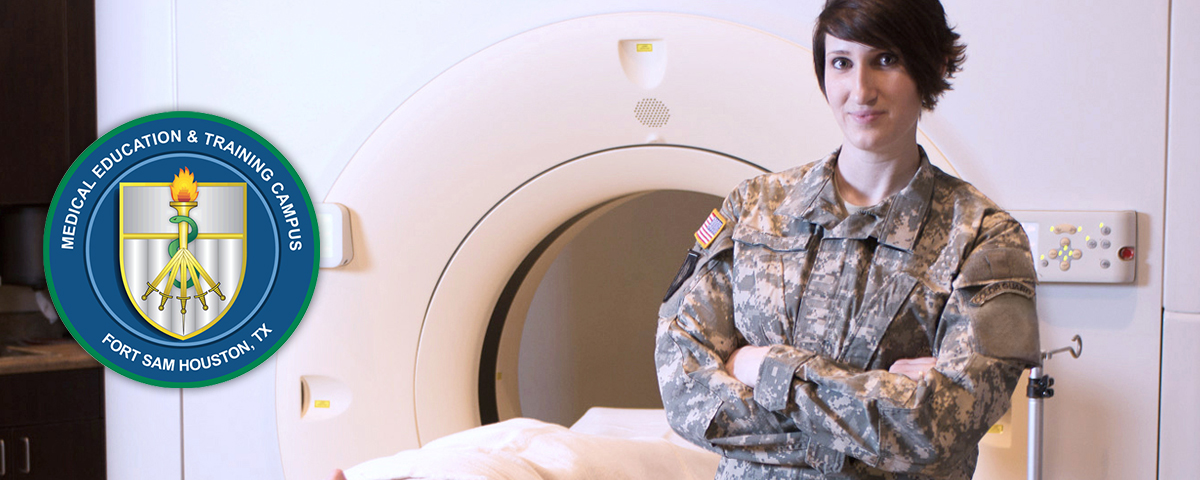 Woman in medical military uniform in front of a MRI machine